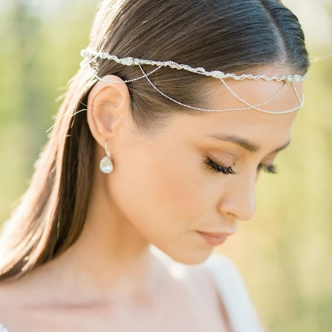 silver boho inspired bridal crown with draped chains and crystals. handmade in toronto by blair nadeau 