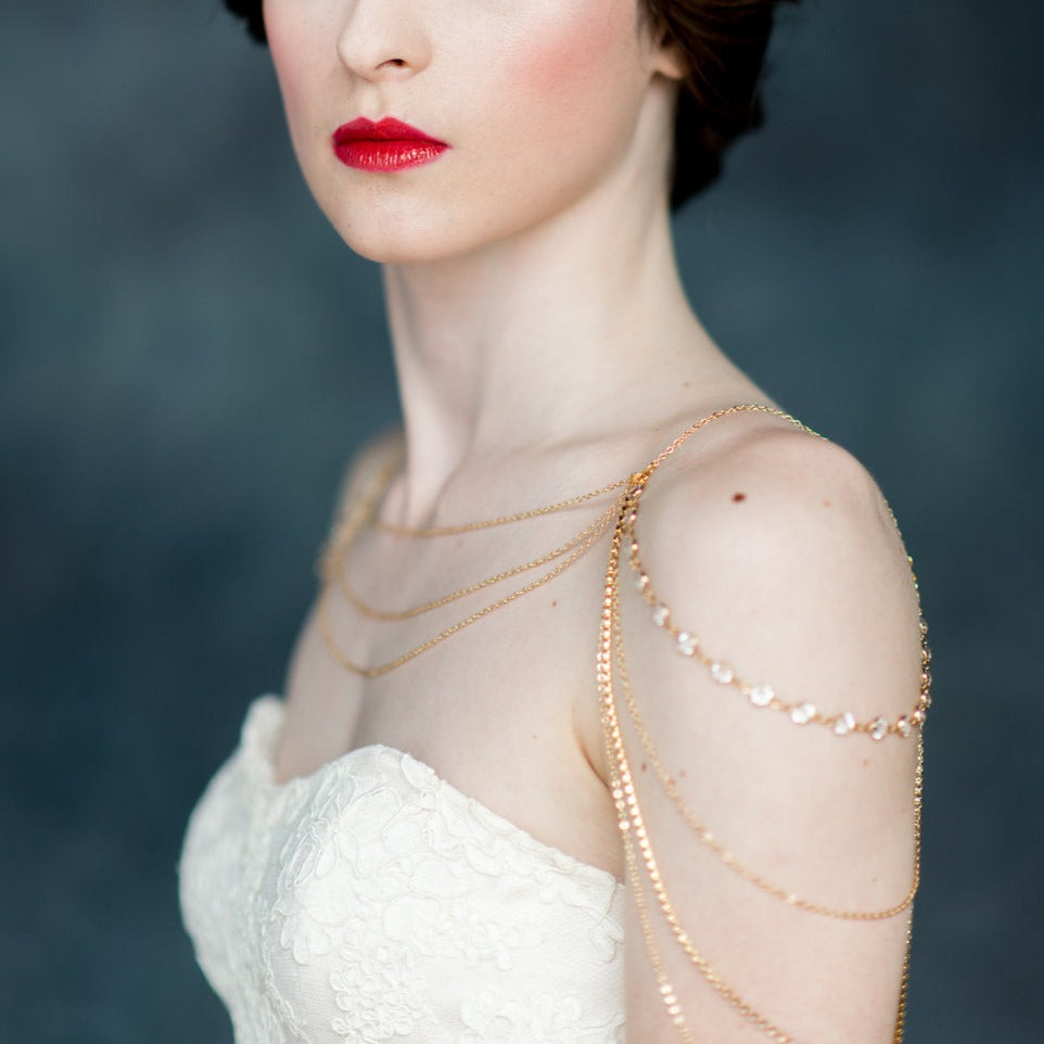 rhinestone and crystal chain shoulder necklace with draped sleeves, front and back. available in silver, gold and rose gold finishes - handmade in toronto ontario canada by blair nadeau bridal adonrments