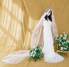 extra long cathedral length waterfall style wedding veil in ivory