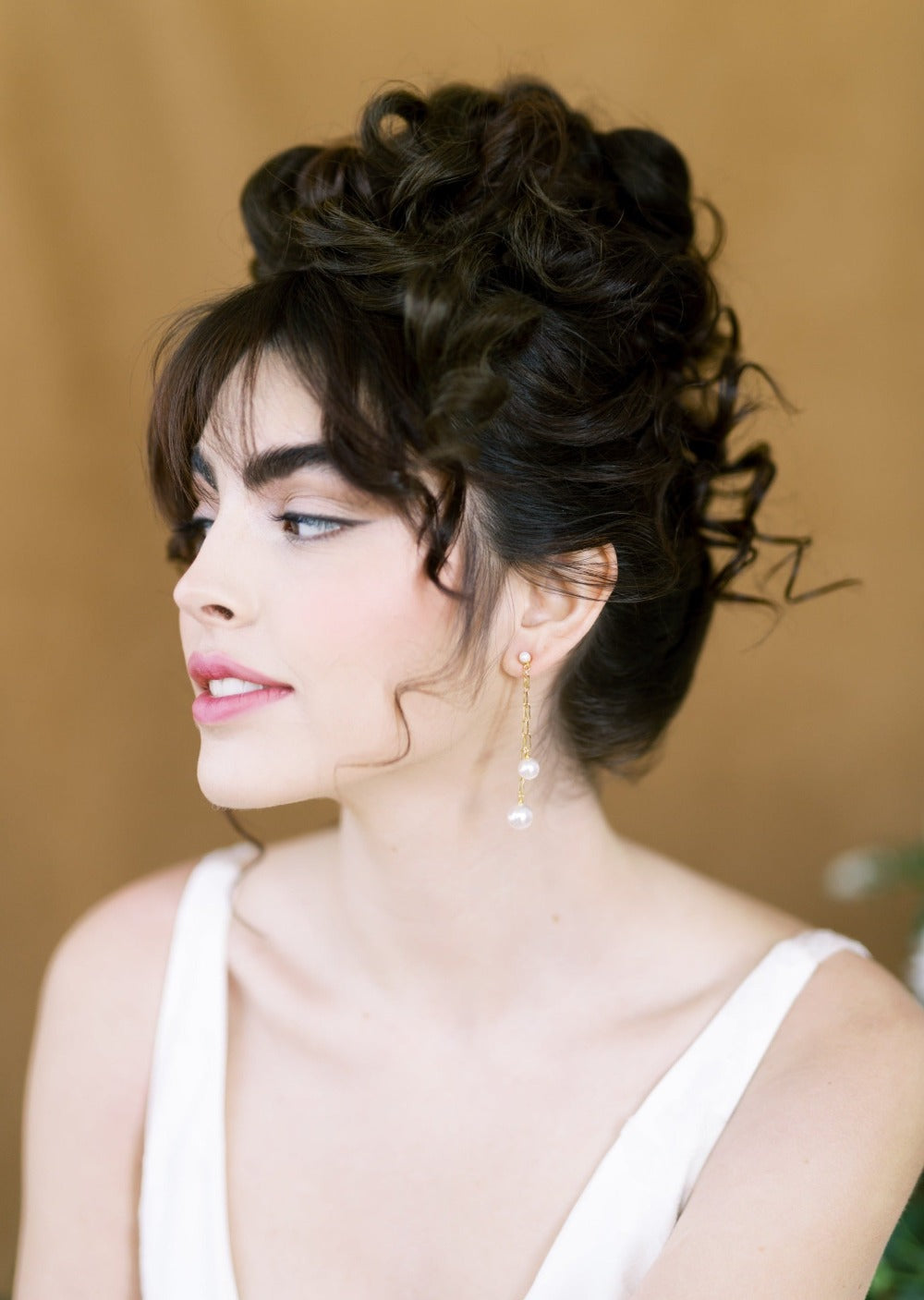 long paper clip chain style earrings with pearl drops. Ear huggy style. Modern bridal accessories for brides