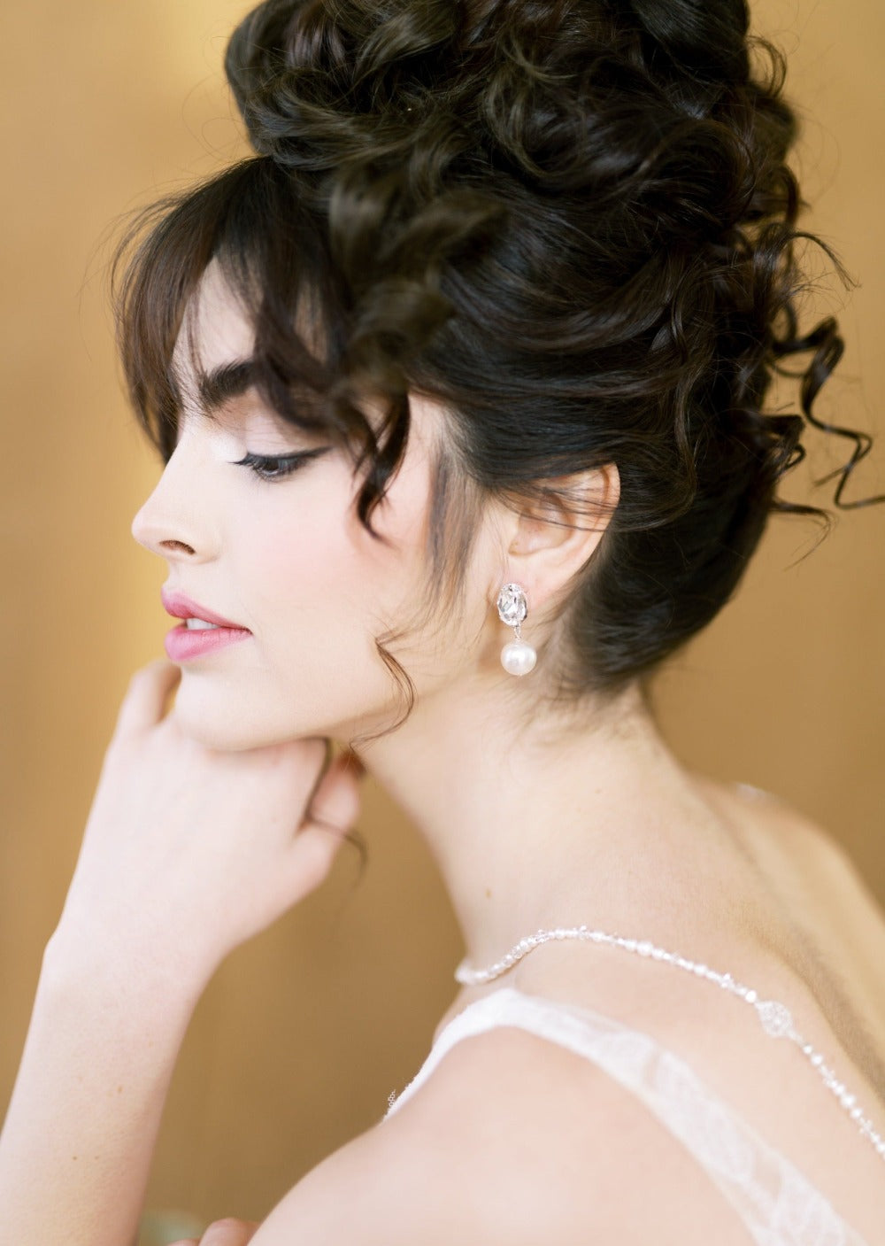 statement large oval rhinestone stud wedding earrings with large round pearl drops. 