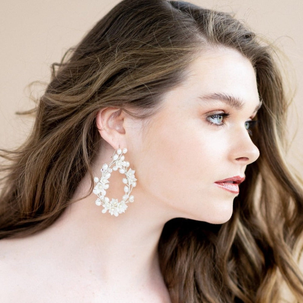 silver oversized vine and flower teardrop hoop earrings . made in toronto canada by Blair nadeau bridal adornments