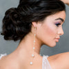 extra long shoulder grazing pearl and chain bridal earrings with round stud for modern brides. made in toronto canada by Blair nadeau bridal adornments