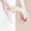 large bridal hairband with flowers, pearls and metal leaves