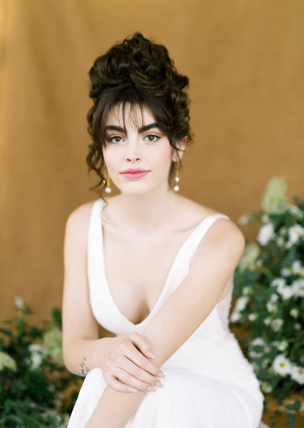 long paper clip chain style earrings with pearl drops. Ear huggy style. Modern bridal accessories for brides