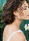modern gold bridal hoop earrings with large crystal teardrops for modern brides