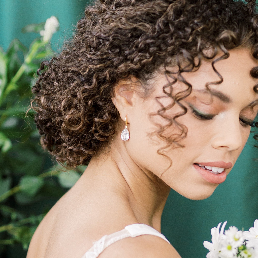 pretty and dainty bridal hoop earrings with 14x10mm crystal teardrops in pendant settings. made of surgical steel and plated in gold, silver, rhodium or rose gold, these sweet little bridal hoops are just the prettiest! handmade in toronto canada by Blair Nadeau Bridal Adornments