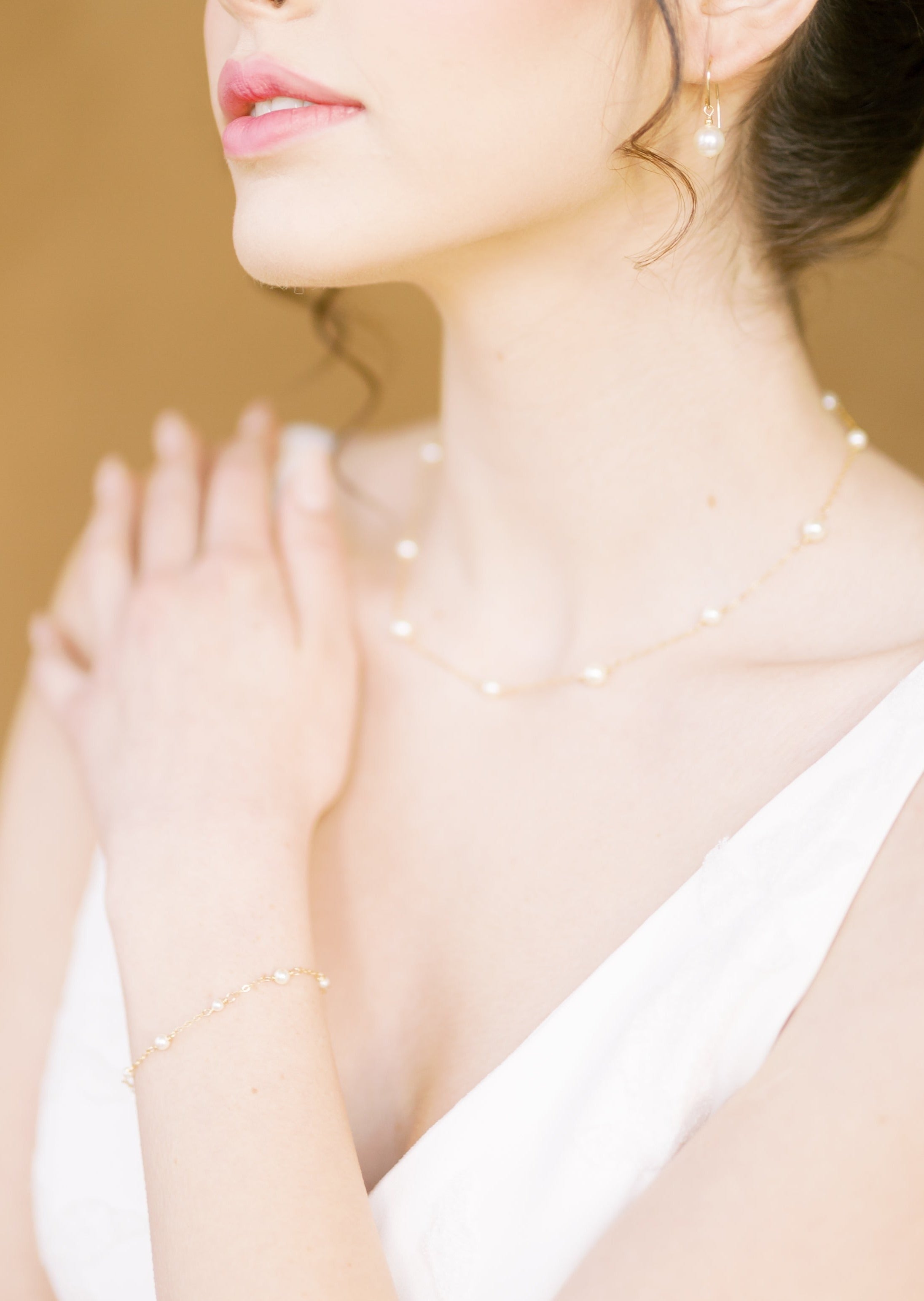 simple pearl bracelet, necklace and earrings in rose gold for bridal jewelry