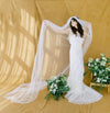 dramatic chapel length wide light and airy sheer tulle wedding veil with gathered comb